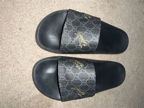 gucci tiger slides fake|Gucci tiger slide goat.